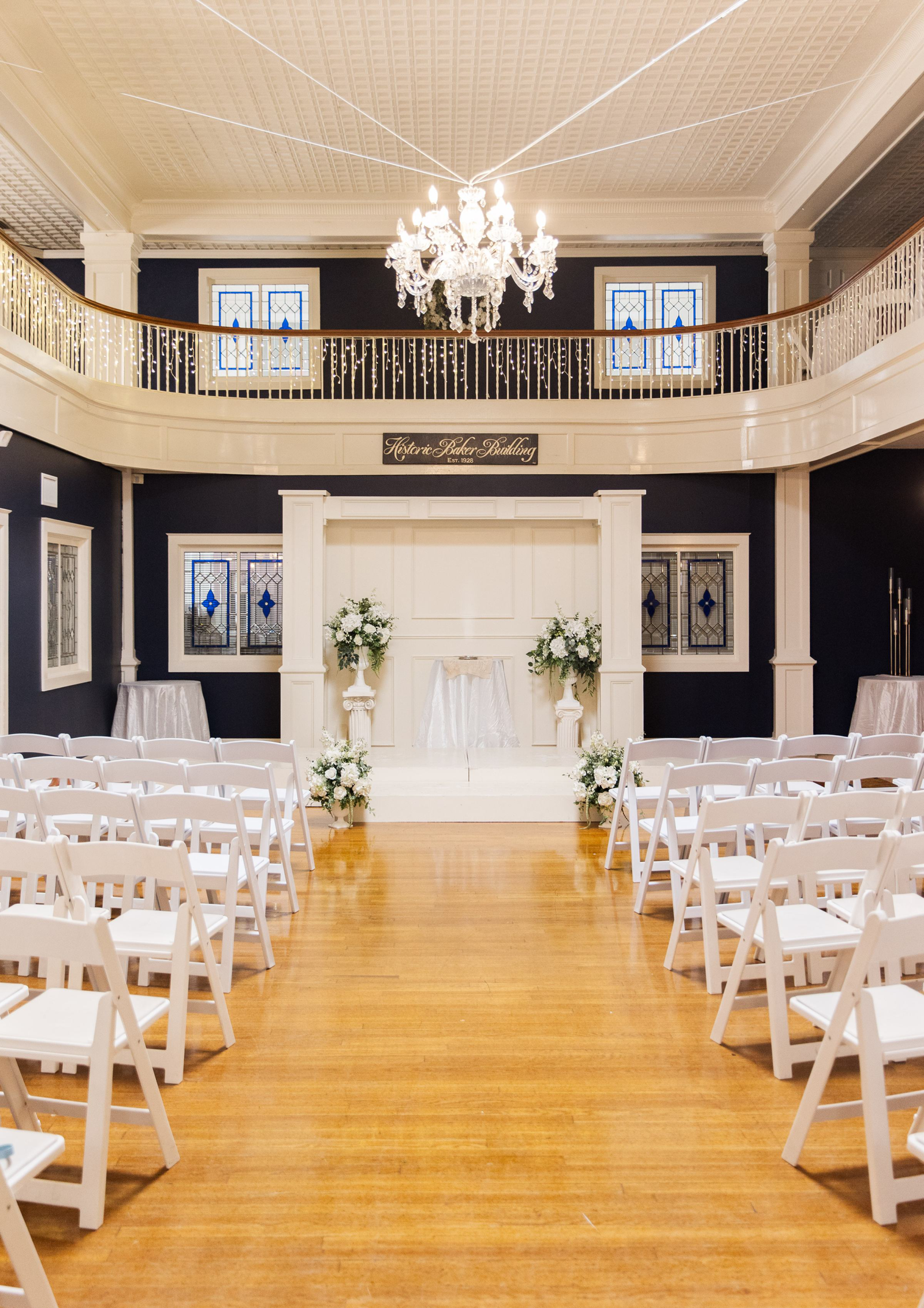 Indoor wedding ceremony aisle at The Historic Baker Building