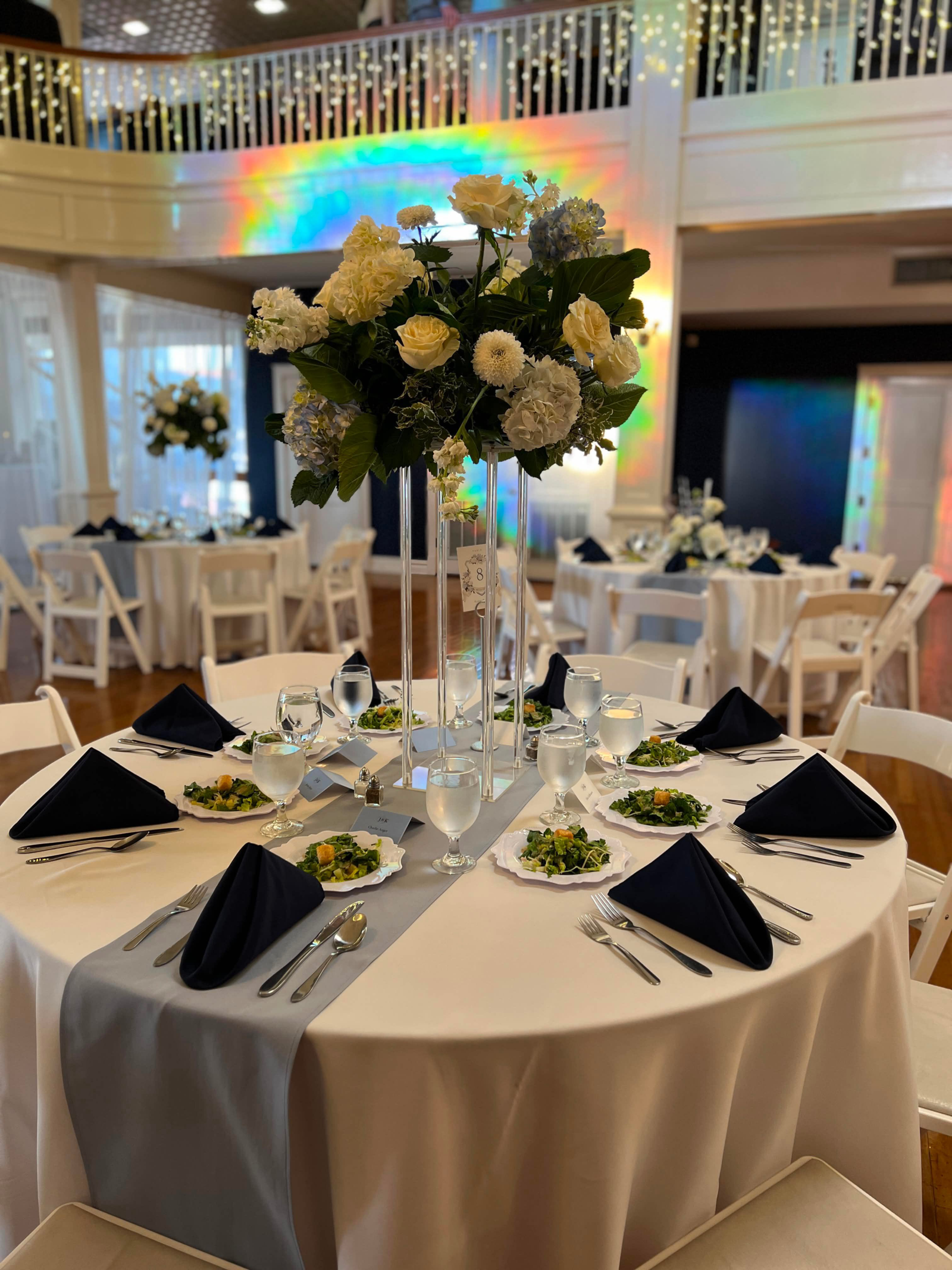 Wedding reception table and floral centerpiece at The Historic Baker Building